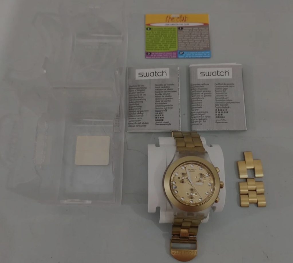 SWATCH FEMININO SÉRIE OURO ( SVCK4032G) 